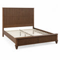 Cama de madera de nogal con cabecero acanalado