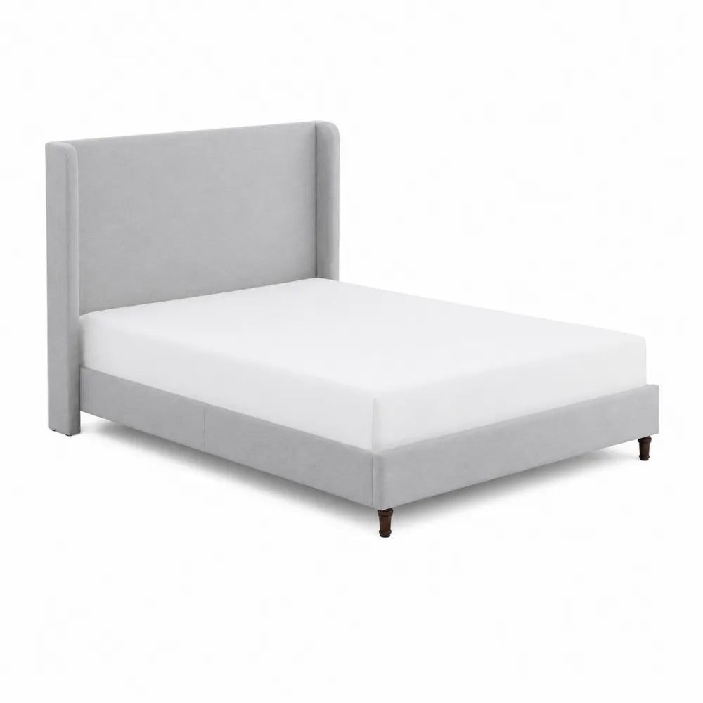 Cama de madera tapizada en poli