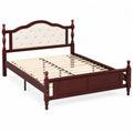 Cama de madera con cabecera tapizada beige